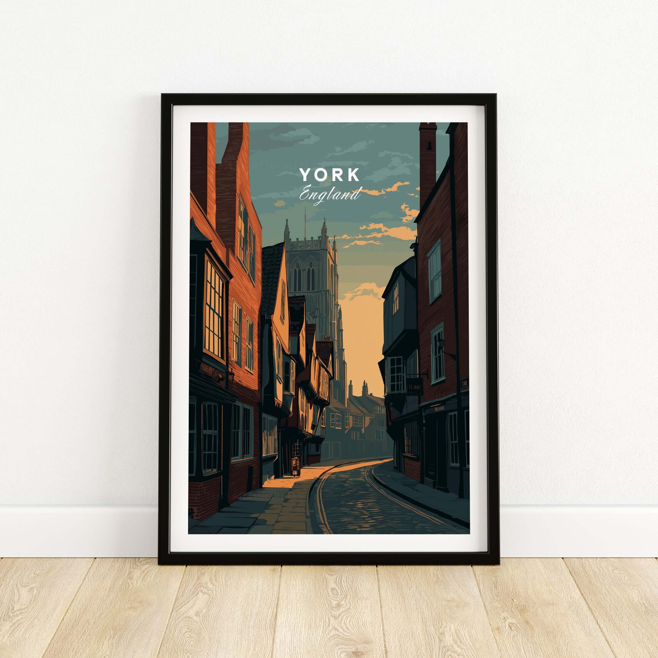 York England Medieval Street Sunset Print - Historic Cityscape Poster in a framed display on wooden floor.