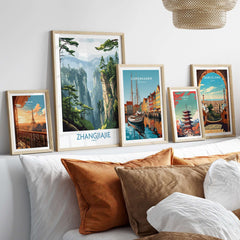 Zhangjiajie China Art Print | Misty Forest Canyon Poster displayed among other city art prints on a cozy sofa.