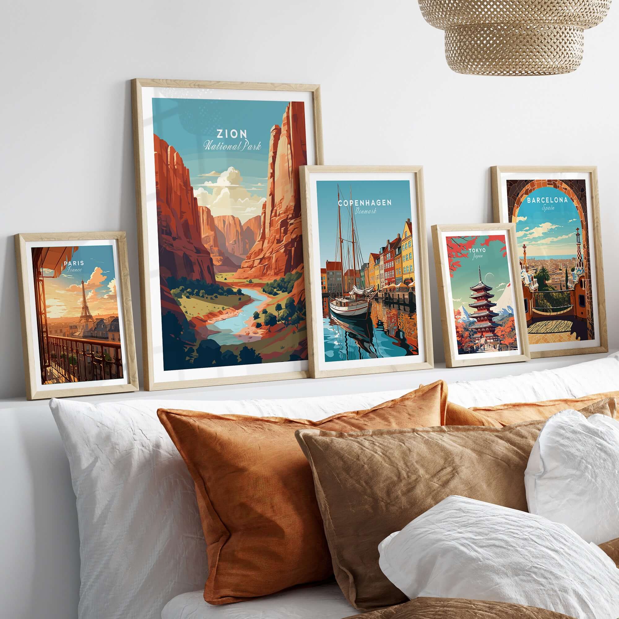 Zion NP Print | Southwest Home Wall Decor displayed among other travel art prints on a stylish bed.