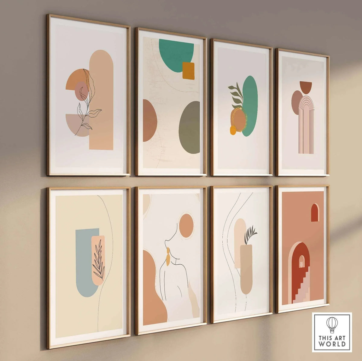 Gallery wall featuring eight abstract prints with modern designs and earthy colors, perfect for contemporary decor.