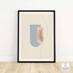Framed Boho art print featuring abstract shapes and a botanical design to enhance modern home decor.