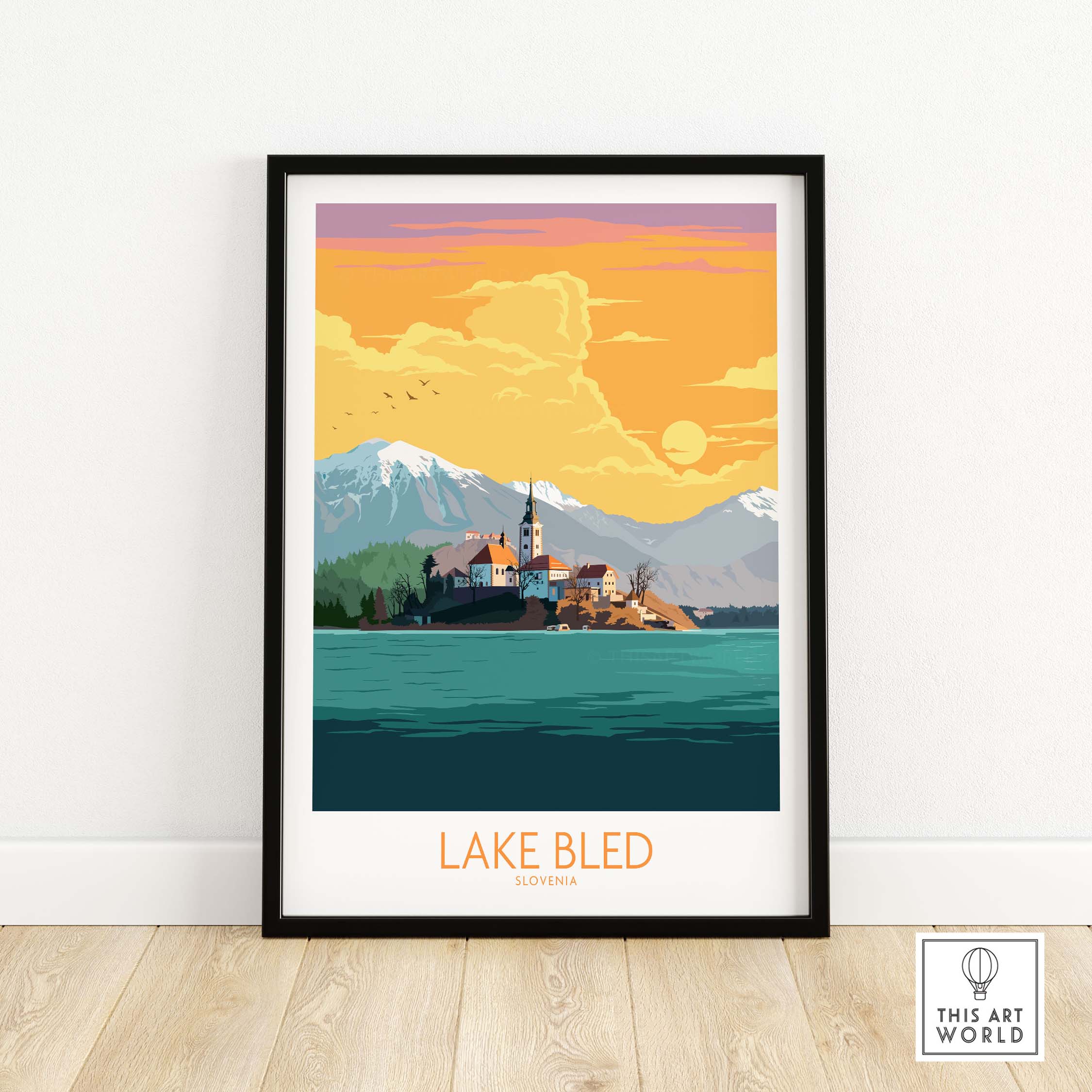 Lake Bled Poster Slovenia showcasing vintage travel art with mountains and sunset in a stylish frame.