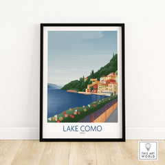 Framed Lake Como wall art print featuring a scenic view of Italy with colorful houses and flowers.