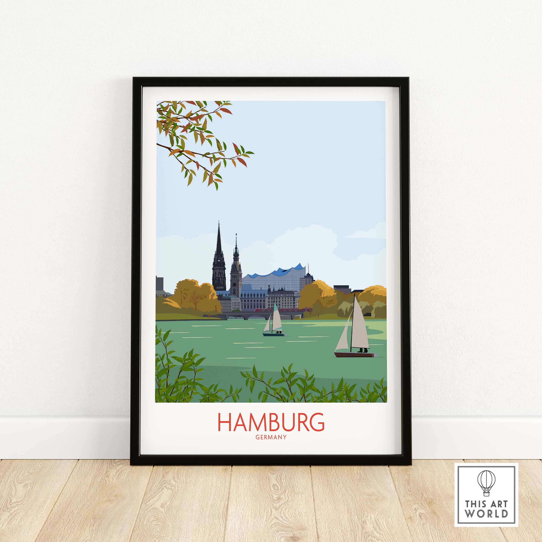 Framed wall art print of Hamburg, Germany featuring iconic buildings and sailboats in a minimalist style.