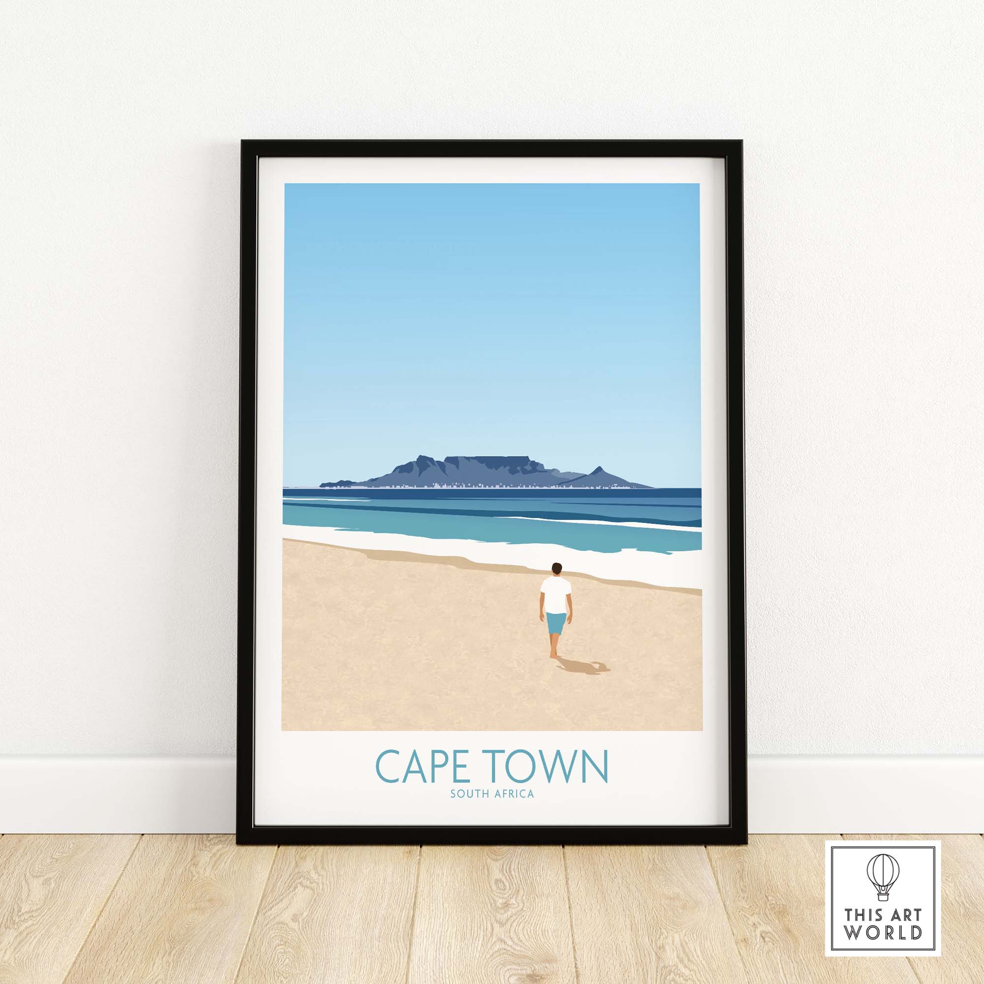 Cape Town wall art print featuring a person walking on the beach with Table Mountain in the background, framed artwork.
