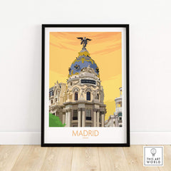 Madrid print poster featuring the iconic Metropolis building with a warm sunset background.