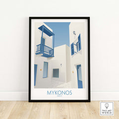 Mykonos wall art print featuring white buildings and blue accents, perfect for home or office decor.