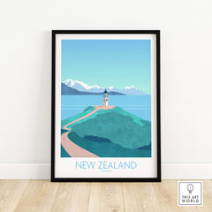 Framed New Zealand print travel poster featuring a lighthouse and scenic coastal landscape.