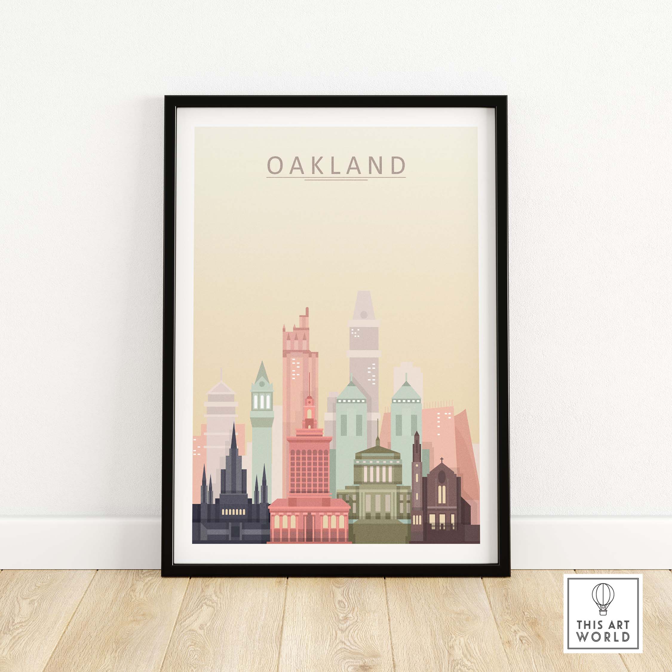 Oakland city skyline art print in pastel colors, framed and displayed on a light wooden floor.