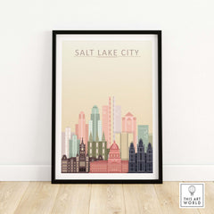 Framed Salt Lake City skyline wall art print featuring pastel colors and iconic buildings.