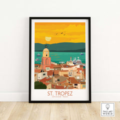 St Tropez poster print featuring a vibrant sunset over the coastal town and boats, perfect for travel art decor.