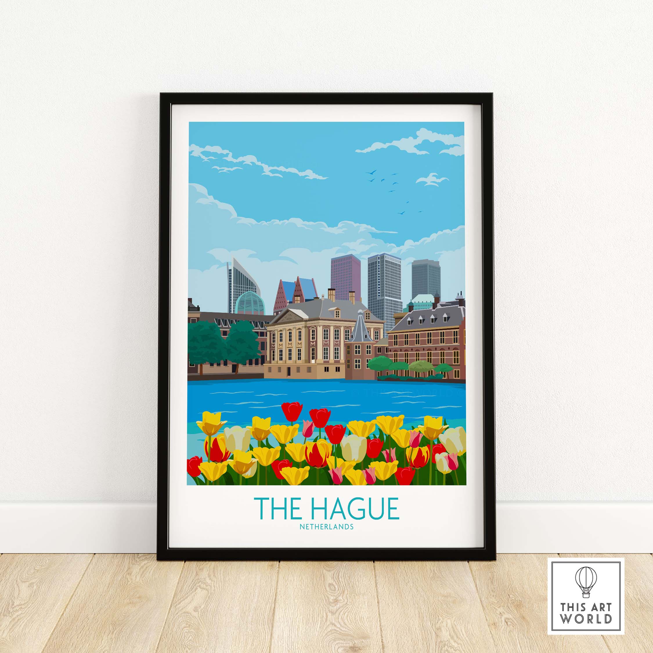 Stylish framed poster of The Hague, Netherlands featuring tulips, buildings, and a clear blue sky, ideal for home decor.