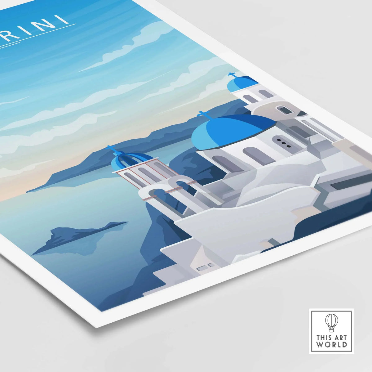 Santorini print wall art featuring blue domes and a coastal landscape in a minimalist style.