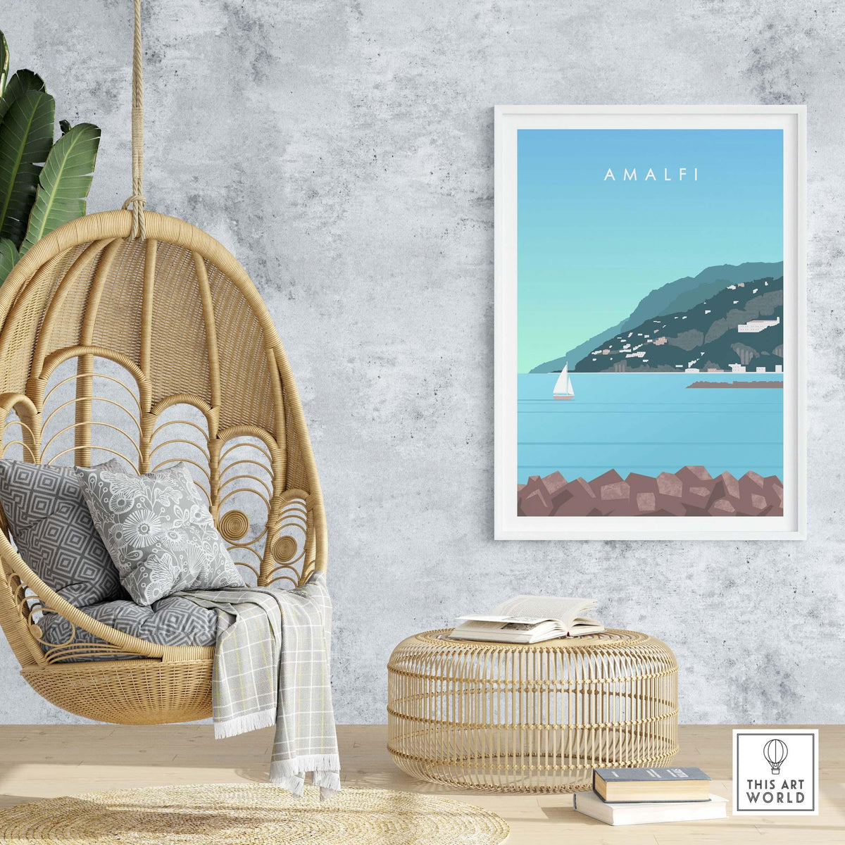 Amalfi Coast Italy print displayed in a stylish home interior with a hanging chair and natural decor.