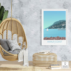 Amalfi Coast print framed in a stylish interior, featuring a scenic coastal view and relaxing decor.