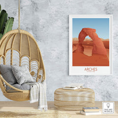 Arches National Park art print displayed in a modern living room with a hanging chair and natural decor.