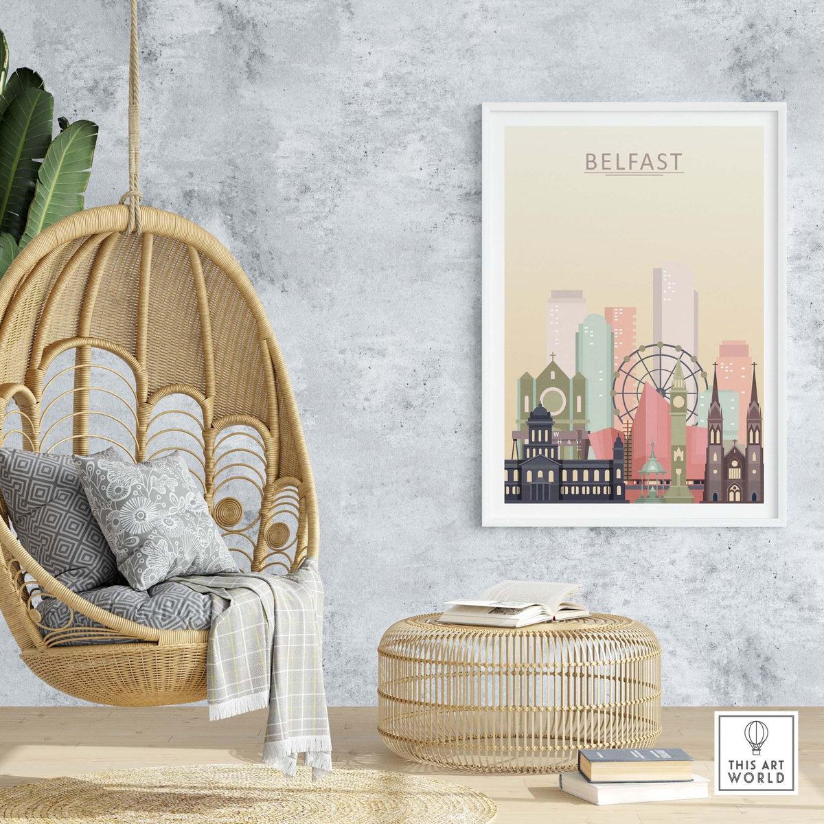 Belfast skyline print in pastel tones displayed in a stylish interior with a hanging chair and modern decor.