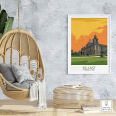 Belfast vintage travel poster displayed in a stylish home setting with hanging chair and decorative elements.