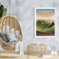 Brecon Beacons National Park poster displayed in a stylish home setting with a hanging chair and contemporary decor.