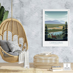 Cairngorms National Park art print displayed in a cozy living space, featuring vibrant landscapes and a deer.