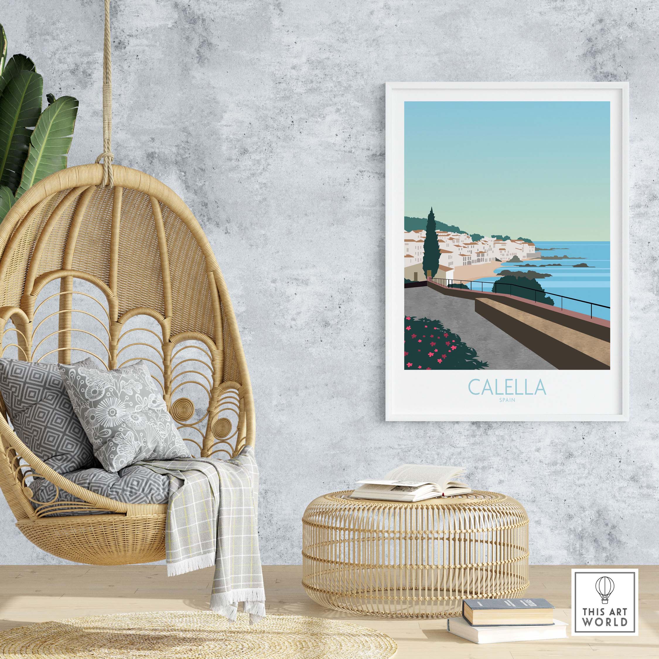 Stylish Costa Brava Calella Spain poster displayed in a modern living space with hanging chair and natural decor.