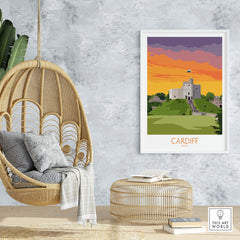 Cardiff Print Wales Travel Poster showcasing a castle and vibrant sunset in modern decor setting.
