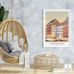 Vintage Copenhagen wall art print displayed in a modern living space with a hanging chair and decorative elements.