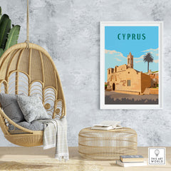 Cyprus Print showcasing a vintage travel poster style in a stylish home setting with a hanging chair.