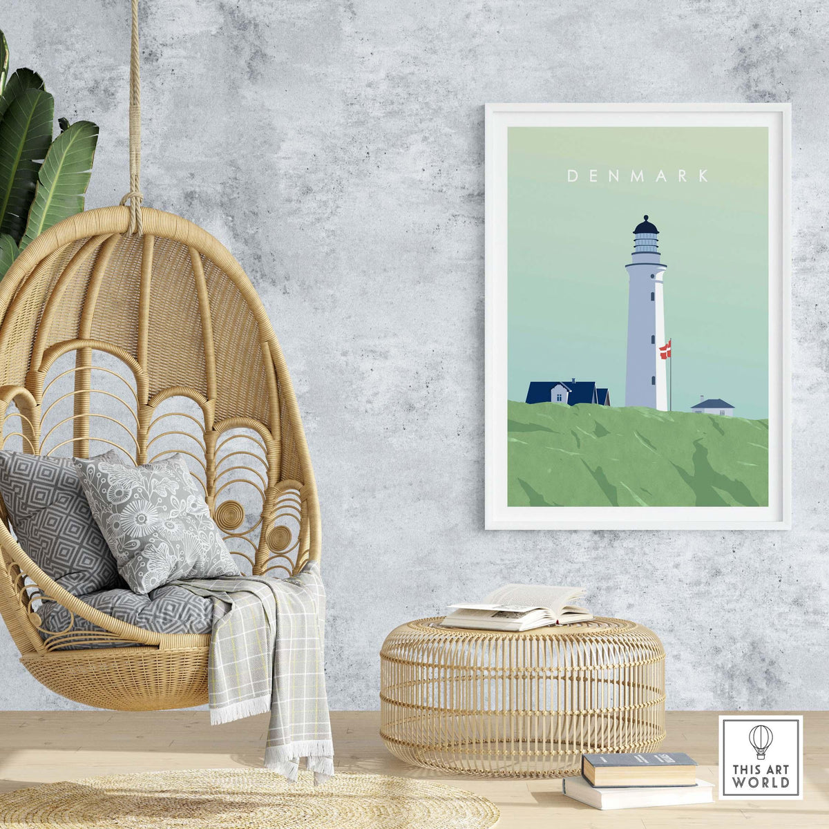 Denmark Print Wall Art Poster featuring a lighthouse in a stylish, modern interior with hanging chair and ottoman.