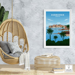 Dubrovnik art print featuring a coastal view, minimalist style, framed in a modern living space with a hanging chair.