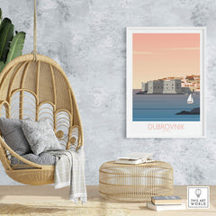 Dubrovnik print travel poster displayed in a stylish bohemian interior with a hanging chair and decorative elements.