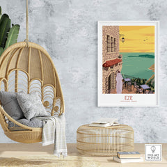 Eze Print France Travel Poster displayed in a cozy interior featuring a hanging chair and stylish decor.