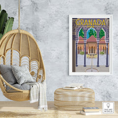 Granada poster print showcasing vintage travel art in a stylish living room with a hanging chair and natural decor.