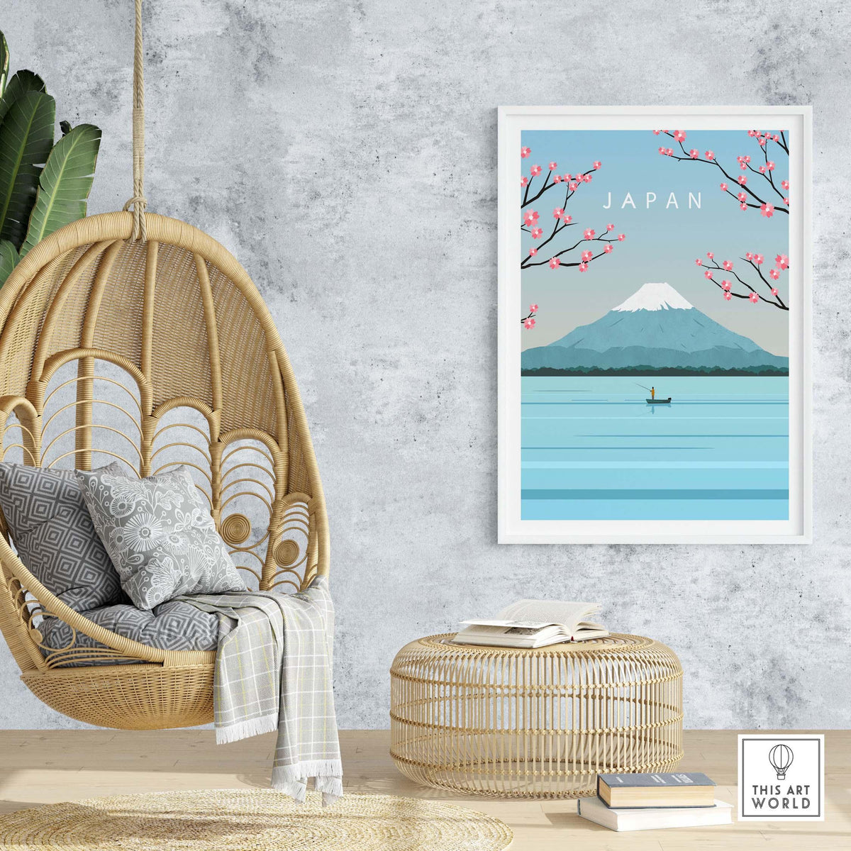Mount Fuji poster hanging in a modern living space, featuring cherry blossoms with a serene water scene.