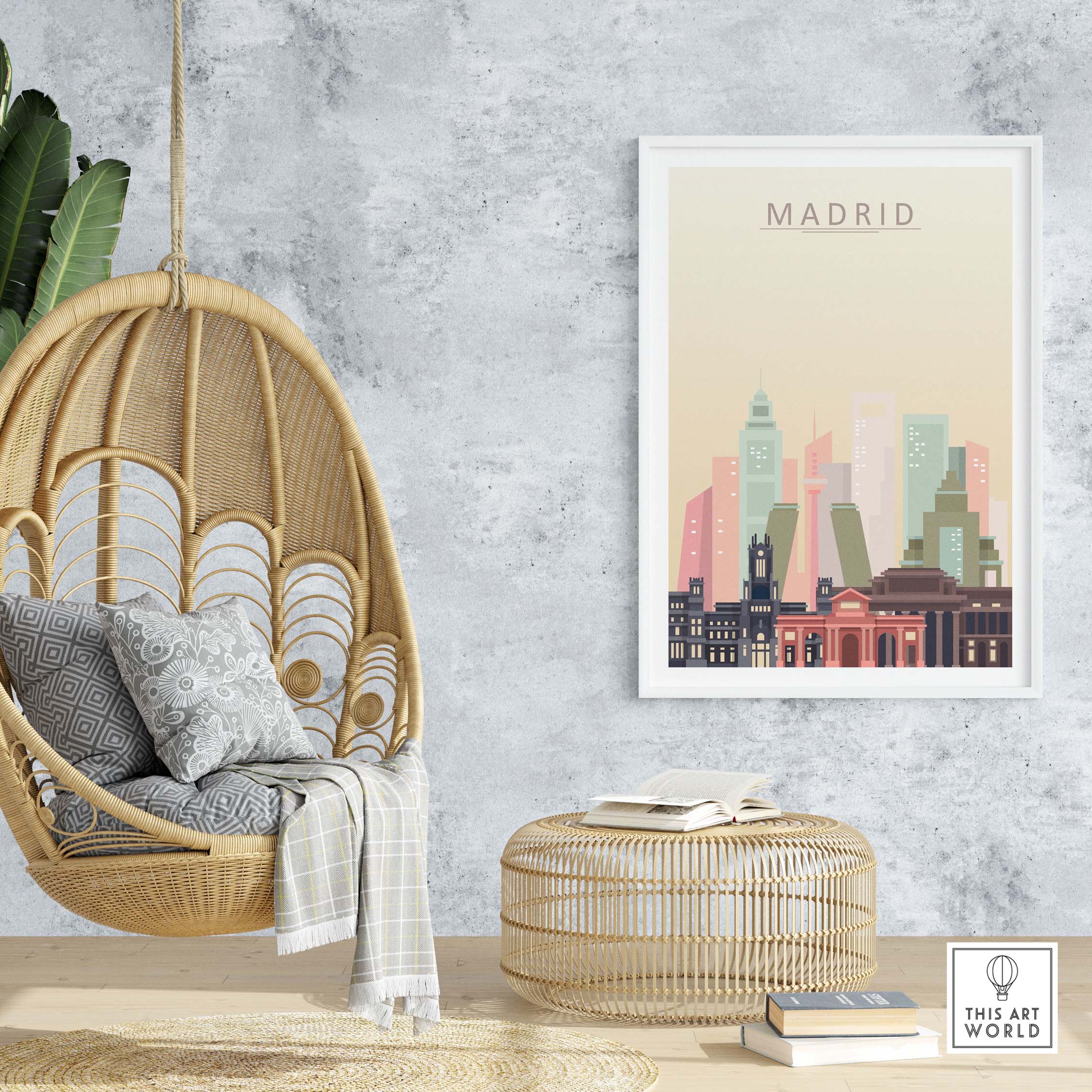 Madrid skyline print in warm pastel tones displayed in a modern living space with hanging chair and rattan decor.