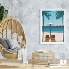 Maldives poster showcasing a tranquil beach scene with palm trees, sun loungers, and a relaxing atmosphere.