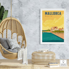 Framed Mallorca Spain print featuring vintage style art, displayed in a stylish living room setting with natural elements.