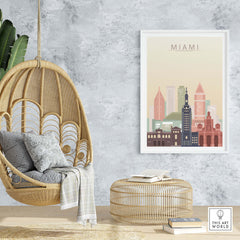 Miami skyline wall art print displayed in a stylish living room with hanging chair and decorative elements.