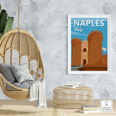 Vintage Naples Italy print framed in stylish decor with hanging chair and natural elements.