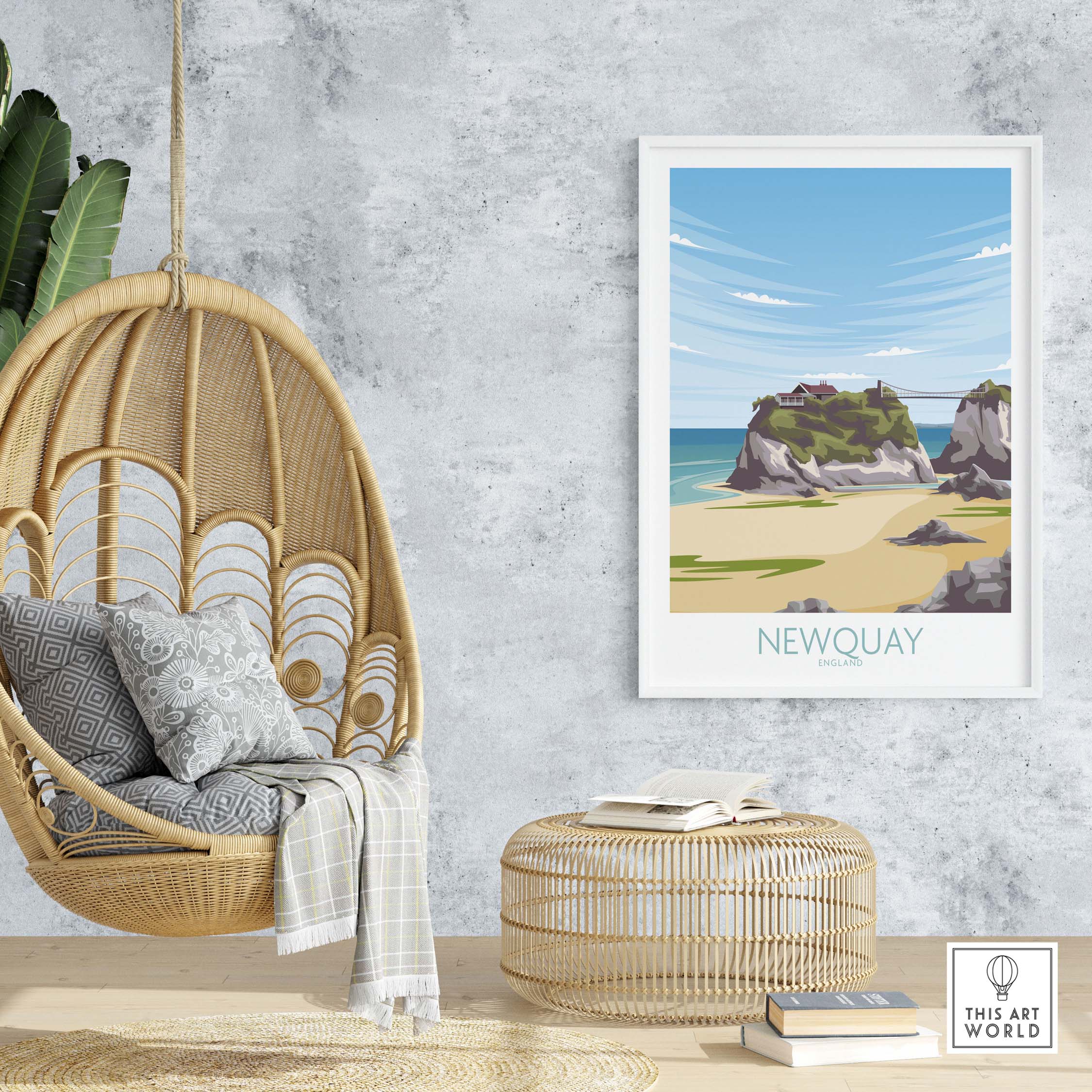 Newquay Cornwall travel poster hanging in a stylish interior with a hanging chair and natural decor.