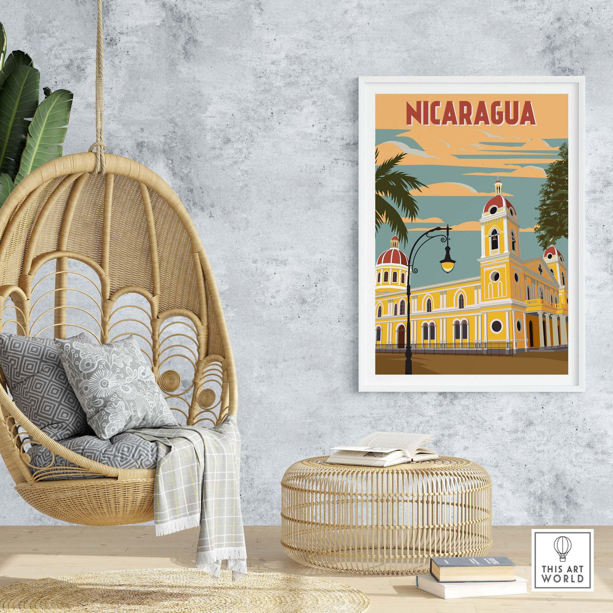Colorful Nicaragua poster featuring vintage architecture, framed art in a stylish home setting with wicker chair.