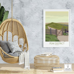 Peak District art print displayed in a stylish home setting with a hanging chair and natural decor.
