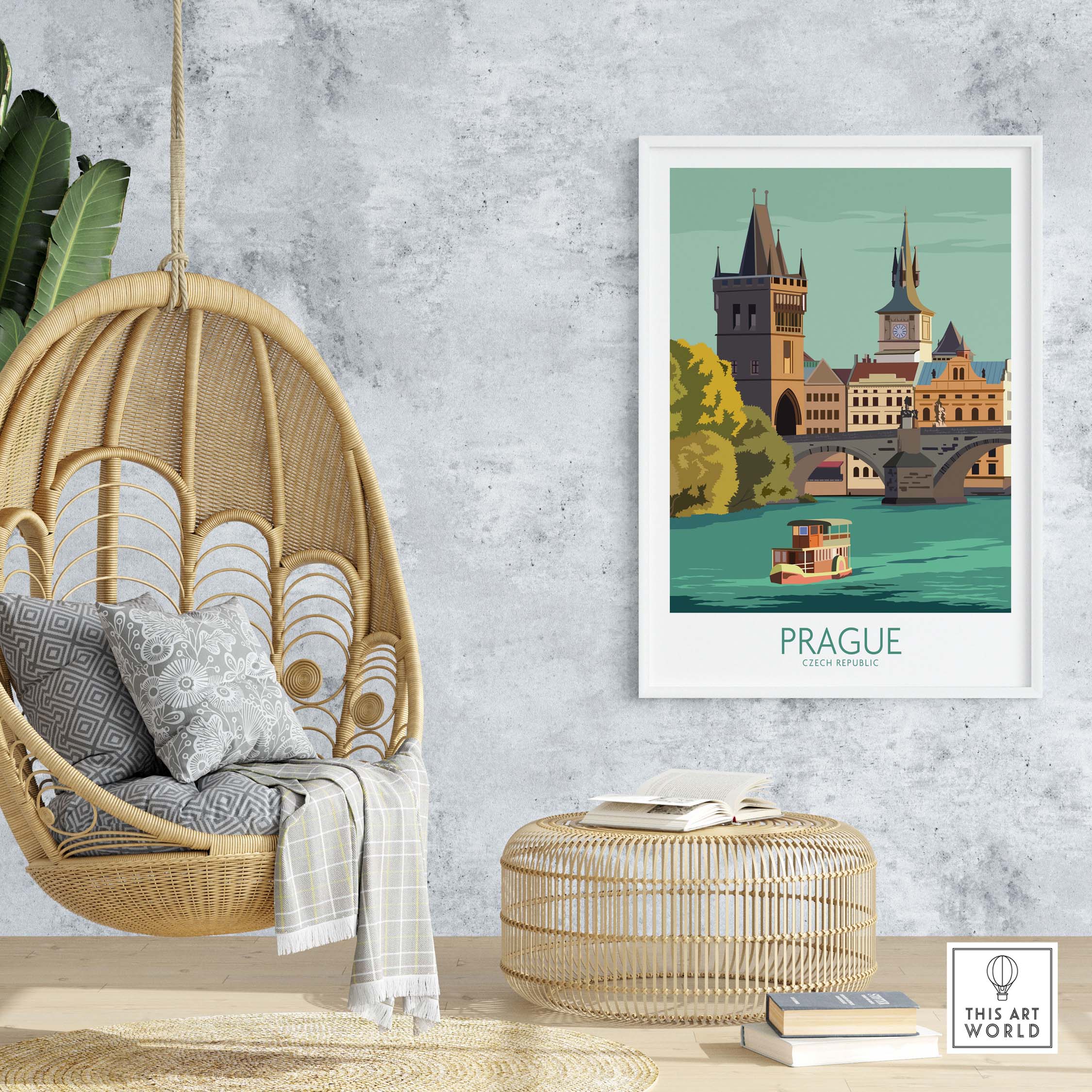 Prague travel poster art print featured in a stylish home decor setting with a hanging chair and wicker accents.