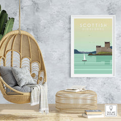 Scottish Highlands print wall art poster displayed in a cozy home setting with a hanging chair and natural decor.