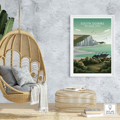 South Downs National Park poster displayed in a stylish home interior with a hanging chair and natural decor.