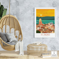 St Tropez Poster Print displayed in a stylish home setting with a hanging chair and decorative elements.