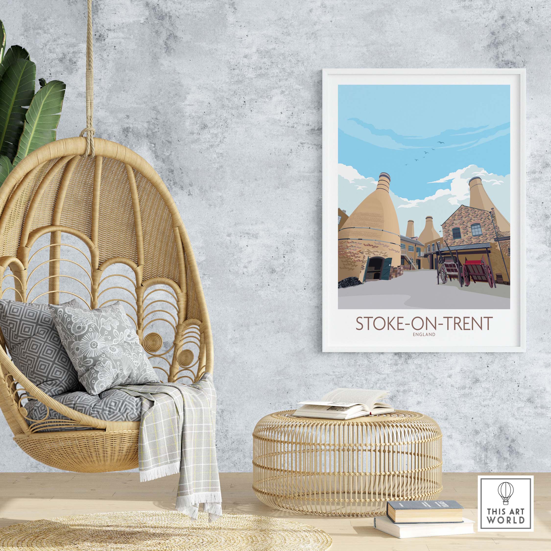 Framed Stoke on Trent print artwork in a stylish interior with hanging chair and decorative elements.