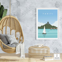 Tahiti poster travel print on wall beside a hanging chair and rattan ottoman, creating a stylish home decor.