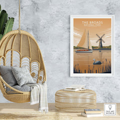 The Broads National Park poster displayed in a modern living space with hanging chair and bohemian decor.