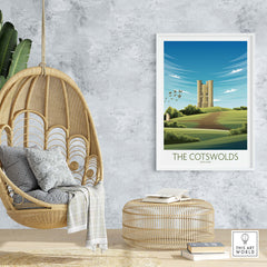 Stylish The Cotswolds Print on wall, with hanging chair and decor, showcasing vintage travel poster art.